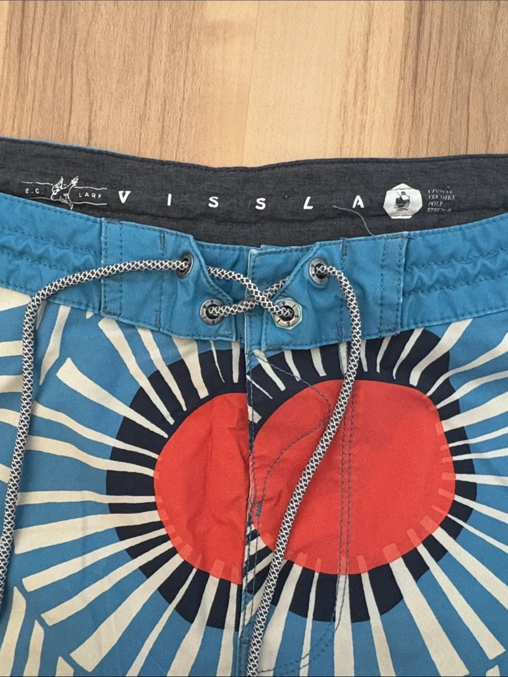 VISSLA Blue, Orange & White Radial Graphic Boardshorts